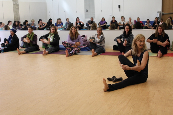 National Kids Yoga Conference Kira Willey cradling leg