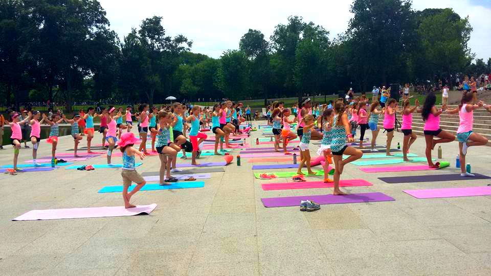 ivivva coasttocoast yoga on the mall tree pose 2